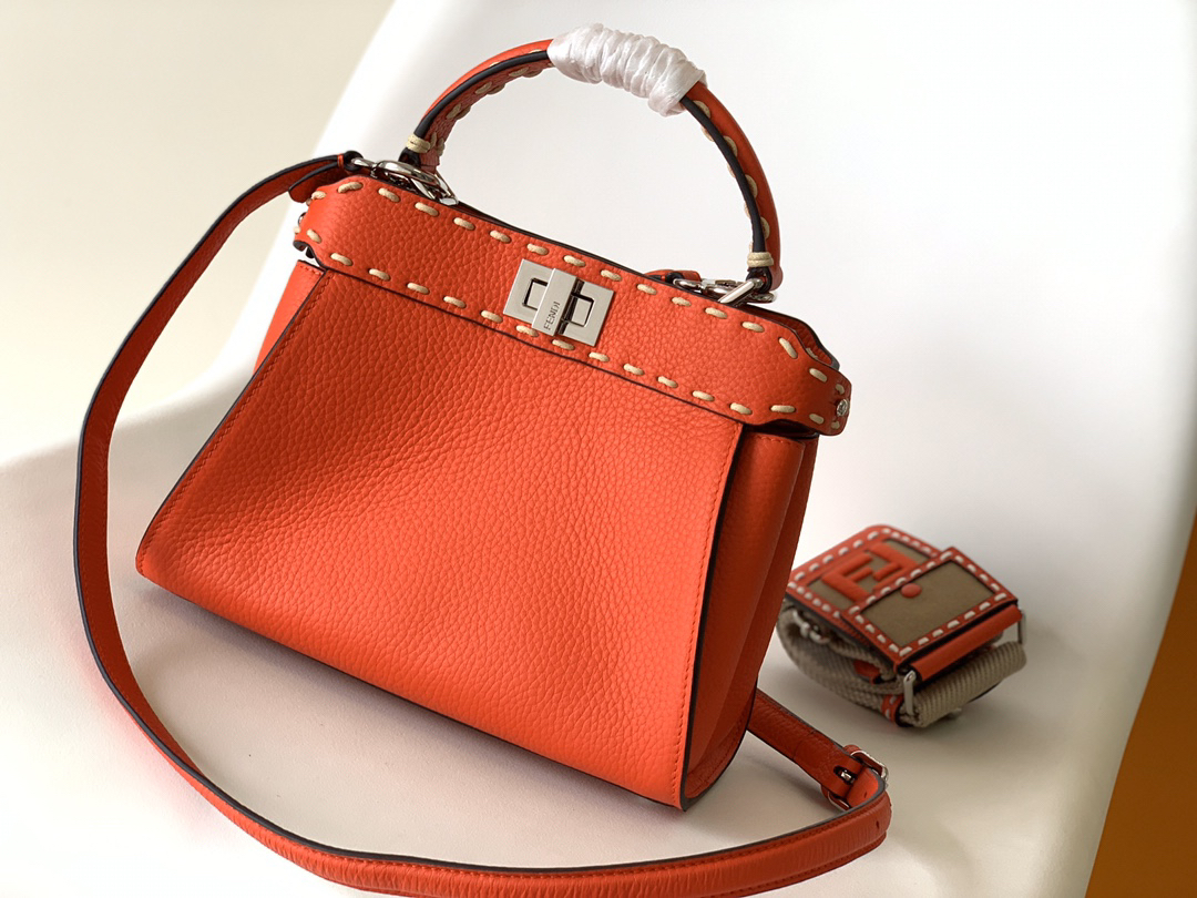 Fendi Peekaboo small handbag, with lotus-patterned cowhide and hand-stitched seams.